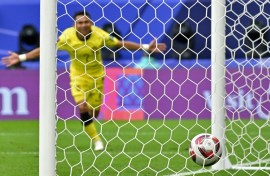 Faisal Halim, seen here scoring against South Korea at the Asian Cup in January, is "responding well" to treatment after being splashed with acid