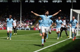 Manchester City defender Josko Gvardiol (C) celebrates scoring against Fulham