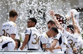 Real Madrid players enjoyed an open-top bus parade after wrapping up their La Liga win last weekend as Barcelona fell short