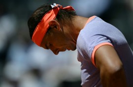 Spain's Rafael Nadal fell to a second-round defeat in Rome ahead of the French Open