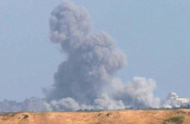 Smoke billows over central Gaza following Israeli air strike