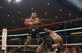 Mike Tyson floors Trevor Berbick in the second round in 1986 to become the youngest world heavyweight champion