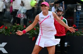 Three of the best: Iga Swiatek celebrates after winning the Rome Open for a third time
