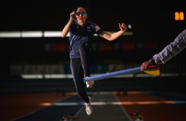 Delya Boulaghlem, a French visually handicapped sprinter and long jumper, takes part in a training session in preparation for the Paris Paralympics