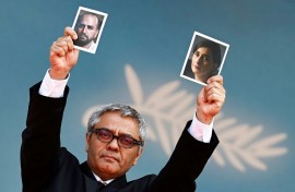 Rasoulof held up pictures of his actors Soheila Golestani  and Missagh Zareh at the premiere