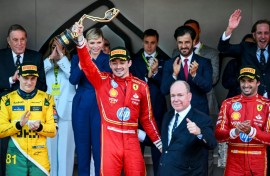 Charles Leclerc celebrates his first home Monaco Grand Prix alongside his Principality's head of state, Prince Albert II