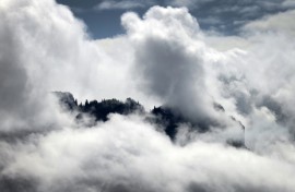 Cloud can both protect Earth from the Sun's radiation or trap it in like a blanket, scientists say