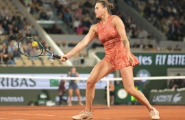Fightback: Aryna Sabalenka plays a backhand return to Paula Badosa