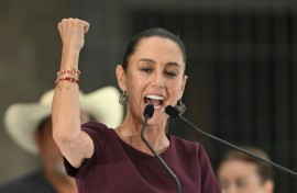 Mexican ruling party presidential candidate Claudia Sheinbaum shows her inked finger as she votes