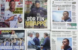This picture taken on June 4, 2024 shows several Spanish newspapers' front pages a day after French forward Kylian Mbappe signed for Real Madrid