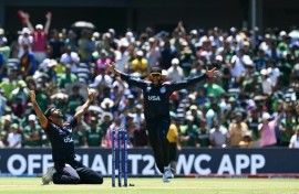 The USA's Saurabh Nethralvakar (left) celebrates after securing a shock win over Pakistan at the T20 Cricket World Cup