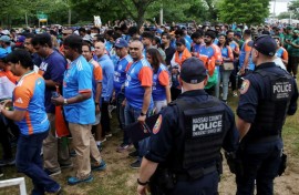 Supporters arrive for the Twenty20 World Cup cricket match between India and Pakistan at Nassau County International Cricket Stadium in East Meadow, New York on Sunday. 