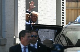 Former US president Donald Trump waves as he departs the Capitol Hill Club following a meeting with US House Republicans on Capitol Hill in Washington, DC, on June 13, 2024