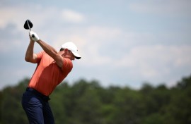 World number three Rory McIlroy of Northern Ireland shared the lead when he teed off in Friday's second round of the 124th US Open at Pinehurst