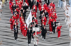 After a drugs scandal, Russian competitors at the Tokyo Games marched at the opening ceremony behind the Russian Olympic Committee flag