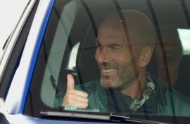 Zinedine Zidane all smiles before joining an illustrious list of ceremonial Le Mans starters including Steve McQueen and Brad Pitt 