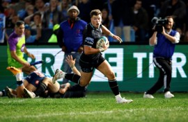 Glasgow Warriors centre Huw Jones scores the try that won the United Rugby Championship final against the Bulls in Pretoria.  
