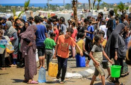 Gazans filling up water in Rafah, the southern city Israel described as Hamas's last stronghold