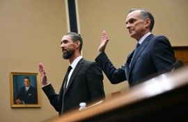 US Olympic swimming legend Michael Phelps (L) and US Anti-Doping Agency chief executive Travis Tygart are sworn in before testimony before a US congressional committee