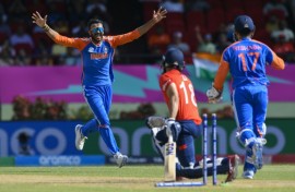 In the wickets: India's Axar Patel celebrates his dismissal of Moeen Ali