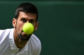 Senior service: Novak Djokovic in action during last year's final against Carlos Alcaraz 
