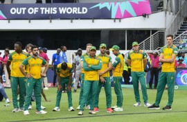 South African players wait on the field after losing the T20 World Cup final to India