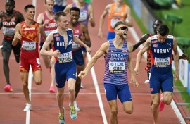 Britain's Josh Kerr celebrates winning the men's 1500m final at the World Athletics Championships