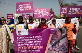 Protesters against female genital mutilation rally outside The Gambia's National Assembly