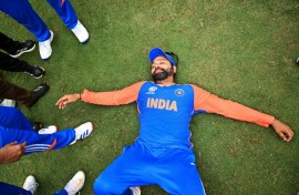 Rohit Sharma lays on the ground after India won the ICC men's Twenty20 World Cup 2024 against South Africa in June
