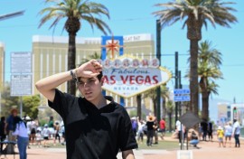 A man walks near the Las Vegas strip during a heatwave in Las Vegas, Nevada, on July 7, 2024