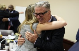 US actor Alec Baldwin hugged members of his legal team as his involuntary manslaughter case was dismissed