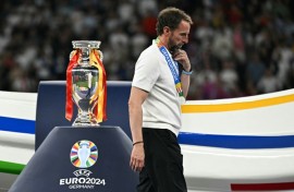 Gareth Southgate walks past the Euros trophy following the defeat to Spain