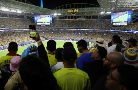 Ticketed fans were forced to watch Sunday's Copa America final from stadium walkways after supporters without tickets stormed into the venue