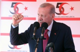Turkish President Recep Tayyip Erdogan speaks during a ceremony in breakaway Turkish Cypriot statelet in the island's north
