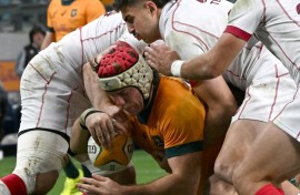 Australia's Fraser McReight scoring under pressure from Georgia at Allianz Stadium in Sydney