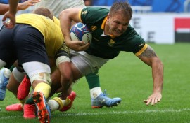 Andre Esterhuizen (R) playing for South Africa against Romania in the 2023 Rugby World Cup in France.