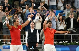 Dream team: Rafael Nadal and Carlos Alcaraz celebrate after beating Argentina's Maximo Gonzalez and Andres Molteni 
