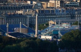 The venues of the Olympic Urban Park arranged round the  Luxor Obelisk at La Concorde seen from the Eiffel Tower