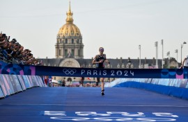France's Cassandre Beaugrand pulled away from the field to win the women's triathlon on home soil