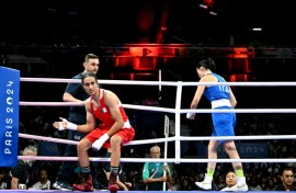 Algeria's Imane Khelif (in red) was given a huge roar on arrival at the Paris arena