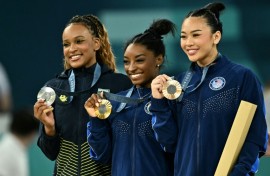 Brazil's Rebeca Andrade and Americans Simone Biles and Sunisa Lee pose with their Olympic gymnastics all-around medals