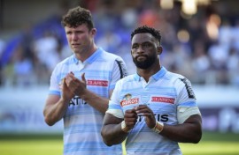 Siya Kolisi (R) joined Racing 92 after lifting a second Rugby World Cup 
