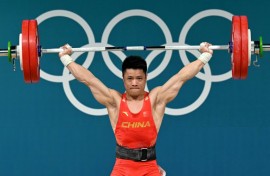 Show of strength - China's Li Fabin powers to weightlifting gold