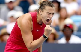 Third-ranked Aryna Sabalenka of Belarus celebrated winning match point against top-ranked Iga Swiatek of Poland in a WTA Cincinnati Open semi-final