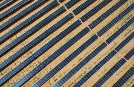 An aerial view shows solar panels at the fishing-solar complementary photovoltaic power generation base in Lianyungang, in eastern China's Jiangsu province
