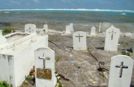 A cemetery on the shoreline in Majuro Atoll is flooded from high tides and ocean surges in the low-lying Marshall Islands, a Pacific atoll chain that rises barely a metre above sea level