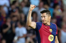Barcelona's Polish forward Robert Lewandowski celebrates scoring his team's second goal against Athletic