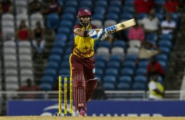 Nicholas Pooran of West Indies hits a six during the T20i win against South Africa at the Brian Lara Cricket Academy Stadium in Trinidad and Tobago on August 23, 2024