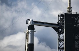 Riding atop a Falcon 9 rocket, the SpaceX Dragon capsule is set to reach a peak altitude of 870 miles (1,400 kilometers) -- higher than any crewed mission in over half a century, since the Apollo era