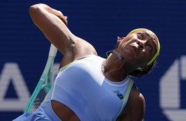 Defending champion Coco Gauff serves on the way to a US Open first-round victory over Varvara Gracheva